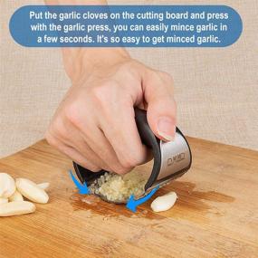 img 1 attached to 🧄 Effortlessly Crush Garlic with DXYD Stainless Steel Rocker Press: Includes Silicone Roller Peeler, Stainless Steel Dessert Spoon, and Cleaning Brush