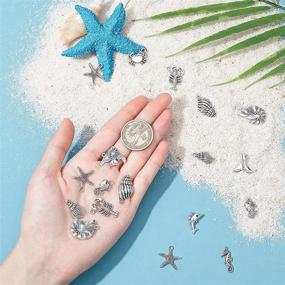 img 1 attached to 🐠 PH PandaHall 90pcs 15 Style Ocean Fish Charms Antique Silver Tibetan Alloy Seashell Marine Animal Sea Creatures Charms Pendants Beads for DIY Bracelet Necklace Jewelry Making in Wakiki Hawaii