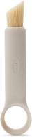 🍄 efficient mushroom cleaning tool: chef'n shroombroom brush and corer, 5.38 inches, in taupe logo