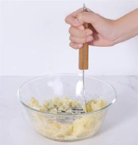 img 2 attached to JACHI Stainless Steel Potato Masher with Non-slip Wooden Handle - Rust-Proof, Easy to Use & Clean - Ideal for Vegetables, Fruits, Baby Food