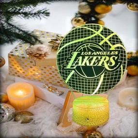 img 1 attached to 🏀 Ночная лампа Unitake Okurimono 3D Lakers Basketball, Лэмп, иллюзия 3D семицветного светодиода, работающего от USB с сенсорным управлением - идеальный подарок для детей (Лэйкерс Баскетбол)