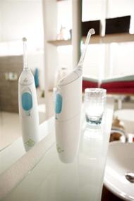 img 3 attached to Улучшенная Philips Sonicare Airfloss Ultra: обновленный серебряный набор из 6 предметов в стандартной упаковке для оптимальной дентальной гигиены.