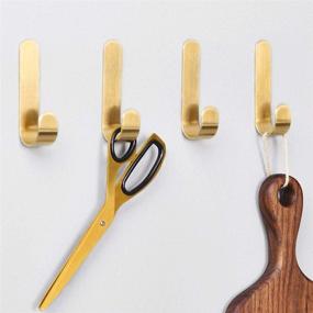 img 4 attached to 🧷 Convenient Pack of 4 Brass Bath Towel Hooks: Brushed Gold Coat Robe Clothes Hook for Wall Mounting - No Screws Required in Bathroom, Kitchen, or Garage