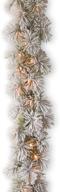 9-foot national tree company glittery bristle pine christmas garland, pre-lit with white lights, frosted branches, plug-in, from the christmas collection, green logo
