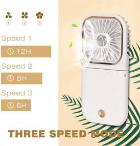 img 1 attached to 5-in-1 Portable Mini Fan with 3000mAh Power Bank and USB Rechargeable Personal Hand Fans - Small Battery Operated Fan with Phone Holder, Handheld and Desk Fan, 3 Speed Adjustable - Neck Lanyard Included - White