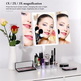 img 3 attached to ProYankiot Trifold Lighted Makeup Mirror with 38 LED Lights, Touch Screen Switch, and Storage - 3X/2X/1X Magnification, 90 Degree Rotation, White