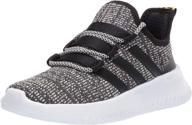 adidas kids' kaptur sneaker: comfortable and stylish footwear for children logo