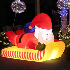 img 2 attached to 7-Foot Christmas Inflatable Outdoor Skiing Santa Claus for Yard Decoration – Downhill Snowboard Xmas Santa Décor Clearance Blow-Up with Built-in LED Lights, Carrying Gift Bag for Holiday Party Yard Garden