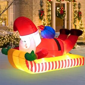 img 3 attached to 7-Foot Christmas Inflatable Outdoor Skiing Santa Claus for Yard Decoration – Downhill Snowboard Xmas Santa Décor Clearance Blow-Up with Built-in LED Lights, Carrying Gift Bag for Holiday Party Yard Garden