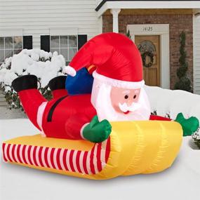 img 1 attached to 7-Foot Christmas Inflatable Outdoor Skiing Santa Claus for Yard Decoration – Downhill Snowboard Xmas Santa Décor Clearance Blow-Up with Built-in LED Lights, Carrying Gift Bag for Holiday Party Yard Garden