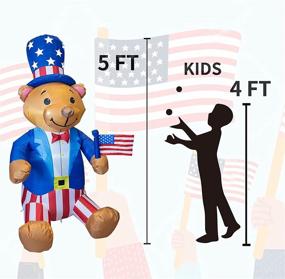 img 2 attached to 🎄 FUNPENY 5 FT Christmas Inflatable Decorations for Outdoor, Blow Up Sitting Bear Xmas Decor with Hat and Flag for Holiday Yard, Indoor, and Home Use