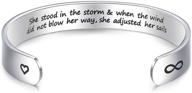 🌈 inspirational gift: when life throws storms, she adjusts her sails - encouragement gift by lparkin logo