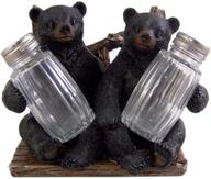 🐻 enhance your table with the decorative side by side black bear salt and pepper shaker napkin holder - shakers included! logo