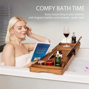 img 3 attached to 🛀 VIVOHOME Expandable 43 Inch Bamboo Bathtub Caddy Tray: Smartphone Tablet Book Holders, Soap Tray, Wine Glass Slot, Brown - Ultimate Bath Relaxation Accessory