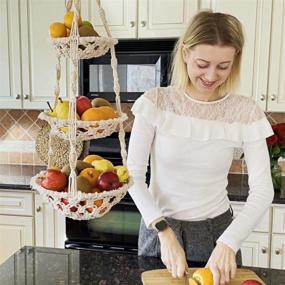 img 1 attached to Kiki's Boho Macrame Fruit Basket Hanging: Stylish Wall Hanging Produce Hammock for Kitchen Décor