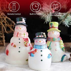 img 2 attached to 🎅 Christmas Snowman Flameless Candles Set - Flickering Battery Operated Realistic Candles with Timer &amp; Remote for Santa Celebration, Christmas Decor, Home and Party (Pack of 3, Multi-Colored)