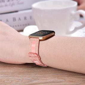 img 3 attached to 🌸 Fintie Breathable Woven Fabric Strap with Reflective Strip for Fitbit Versa 2/Versa Lite/Versa, Pink & Orange Replacement Wristband for Fitbit Versa Smart Watch