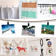 magnolian 100 pack party light hanger: sturdy metal clips for easy hanging of string lights. perfect for outdoor parties and shower curtain decorations, in sleek black логотип