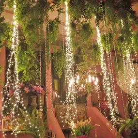 img 1 attached to 🌟 Sparkling Starry String Lights: 220 LED 11 Strand Waterfall Tree Vine Decorative Lights with Remote Timer - Battery Operated Silver Wire Branch Lights for Bedroom, Garden, Christmas & More (White)