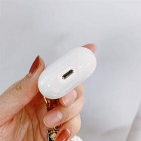 img 1 attached to Чехол для AirPods Ownest с жемчужным брелоком, блестящим радужным глиттером, милый чехол для девочек и мальчиков - жесткий чехол для Airpods 2 и 1, милый для Airpods - белый