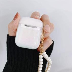 img 2 attached to Чехол для AirPods Ownest с жемчужным брелоком, блестящим радужным глиттером, милый чехол для девочек и мальчиков - жесткий чехол для Airpods 2 и 1, милый для Airpods - белый