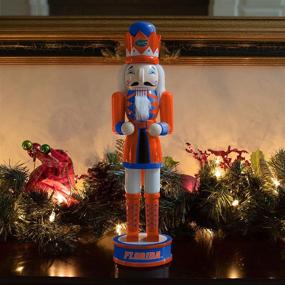 img 1 attached to 🎁 Shop the FOCO NCAA Team Logo Collectible Holiday 14" Nutcracker - Must-Have for Die-Hard Fans!