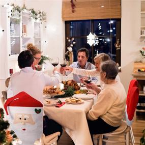 img 2 attached to 🎅 Christmas Chair Covers Decor - Set of 4, Santa Claus Red Hat Snowflake Chair Xmas Cap, Kitchen Dining Chair Slipcovers for Holiday Festive Decorations (Red Santa Hat)