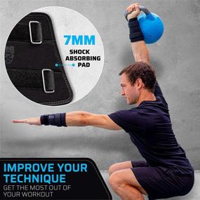 img 2 attached to 🏋️ THEFITGUY Kettlebell Wrist Guards - Reduce Forearm Wrist Bruises, Adjustable Straps for Perfect Fit on Skin or Shirt, Thick Padding for Kettlebell Impact Absorption, Optimal Arm Protection (Pair)