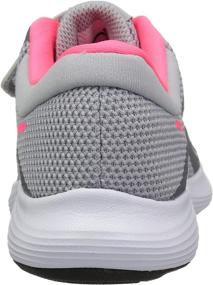 img 2 attached to NIKE Revolution Sneaker White Team Red Black Sports & Fitness in Running