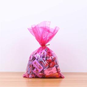 img 2 attached to Pink Translucent Cellophane Wrapping Rolls - 100’ ft Long, 16’’ Wide, 2.3Mil Thick for Gifts, Treats, Candy, Cookies - Shinny, Colorful Cello for Christmas Holiday & Gift Baskets!