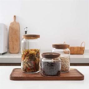 img 2 attached to 🍯 KMwares Clear Glass Food Jars/Canisters with Airtight Acacia Wood Lids - Set of 3, Ideal for Kitchen/Bathroom/Pantry Storage, Serving Pasta, Candy, Snacks, Tea, Coffee, and Dry Food