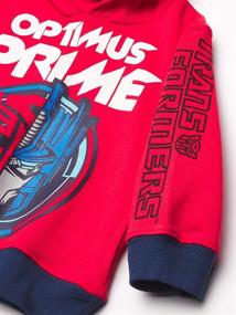 img 2 attached to 👦 Optimus Toddler Boys' Transformers Athleisure Bundle Set: Graphic Hoodie, T-Shirt, & Jogger Sweatpant