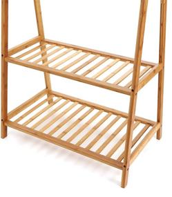 img 2 attached to Finnhomy Extra Large Bamboo Clothes Rack: Portable Garment Rack with 2-Tier Storage Box Shelves for Entryway and Bedroom - Patented Design