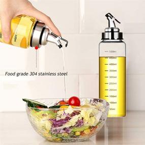 img 1 attached to 🍶 17oz Clear Glass Olive Oil Dispenser Bottle - 500ml Oil & Vinegar Cruet: Dripless Spout & No-Drip Carafe Decanter for Kitchen