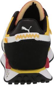 img 2 attached to PUMA Peanuts Future Sneaker Black Maize