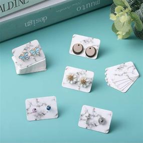 img 1 attached to 📦 1200 Marble Earring Display Cards Set - Includes 300 Paper Earring Display Cards, 600 Earring Backs, and 300 Self-Seal Bags for Jewelry (1 x 1.4 Inch, White)