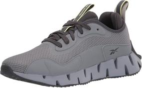 img 4 attached to Reebok Mens Dynamica Sneaker Black Men's Shoes