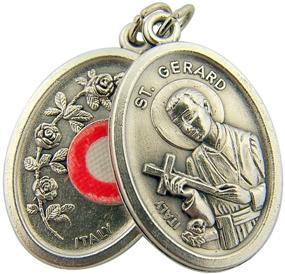 img 1 attached to 🌟 Stunning 1 Inch Silver Toned Catholic Saint Cloth Relic Medal on Base