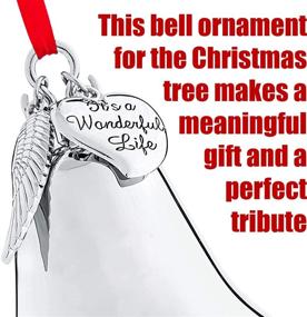 img 1 attached to Silver Shiny Christmas Bell Ornament with Angel Wing and Heart Charms - Klikel It's A Wonderful Life Bell Ornament for Christmas Tree - Includes Gift Box