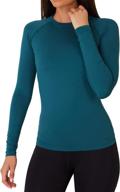 tca women's superthermal long sleeve performance base layer: the ultimate running training top logo