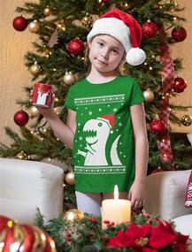 img 1 attached to 🎄 Big Trex Santa Dinosaur Sweater Style Kids T-Shirt: Festive and Fun Ugly Christmas Apparel