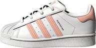 superstar sneaker by adidas originals - unisex child's ultimate choice logo