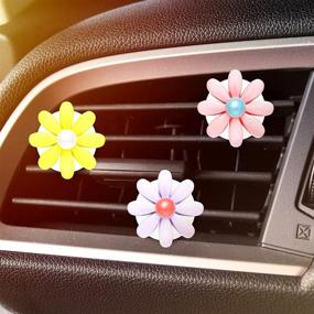 img 1 attached to Daisy Delight: 12-Piece Air Vent Clips for Car Interior Decoration & Freshening