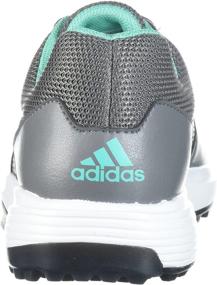 img 2 attached to Обувь Adidas Traxion в белом и черном цветах - превосходное сцепление для спортивной производительности.