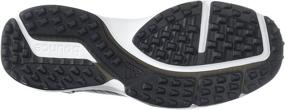 img 1 attached to Adidas Traxion Footwear in White and Black - Superior Traction for Athletic Performance