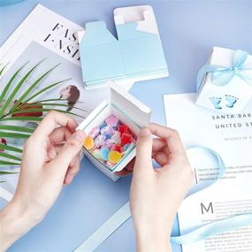 img 2 attached to 👶 PH PandaHall 60 Sets Baby Shower Candy Boxes - Footprints Folding Boxes Blue Paper Gift Box with Ribbon - Party Table Décor, Birthday Party, Gift Favor (2.4 x 2.4 x 2.4 Inch)