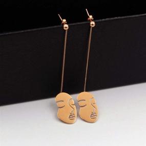 img 1 attached to Geometric Dangle Stud Earrings - Hollow Titanium Steel Rose Gold Plated Statement Earrings featuring a Human Face Shape