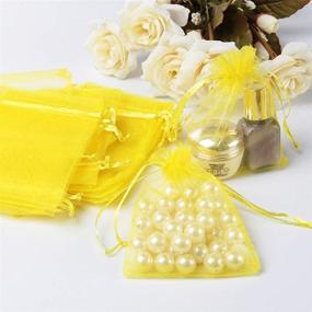 img 1 attached to 🎀 Stratalife 50PCS Drawstring Organza Bags - Yellow Transparent Jewelry Favor Pouches for Baby Showers, Weddings or Parties