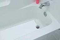 white safety drain hotel bathtub logo