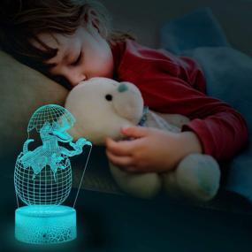 img 1 attached to 🦖 Optimized Search: 3D Dinosaur Night Light Lamp with Remote Control – Best Birthday and Christmas Toy Gifts for Boys and Girls, 4-Patterns and 16-Colors Illusion Nightlight